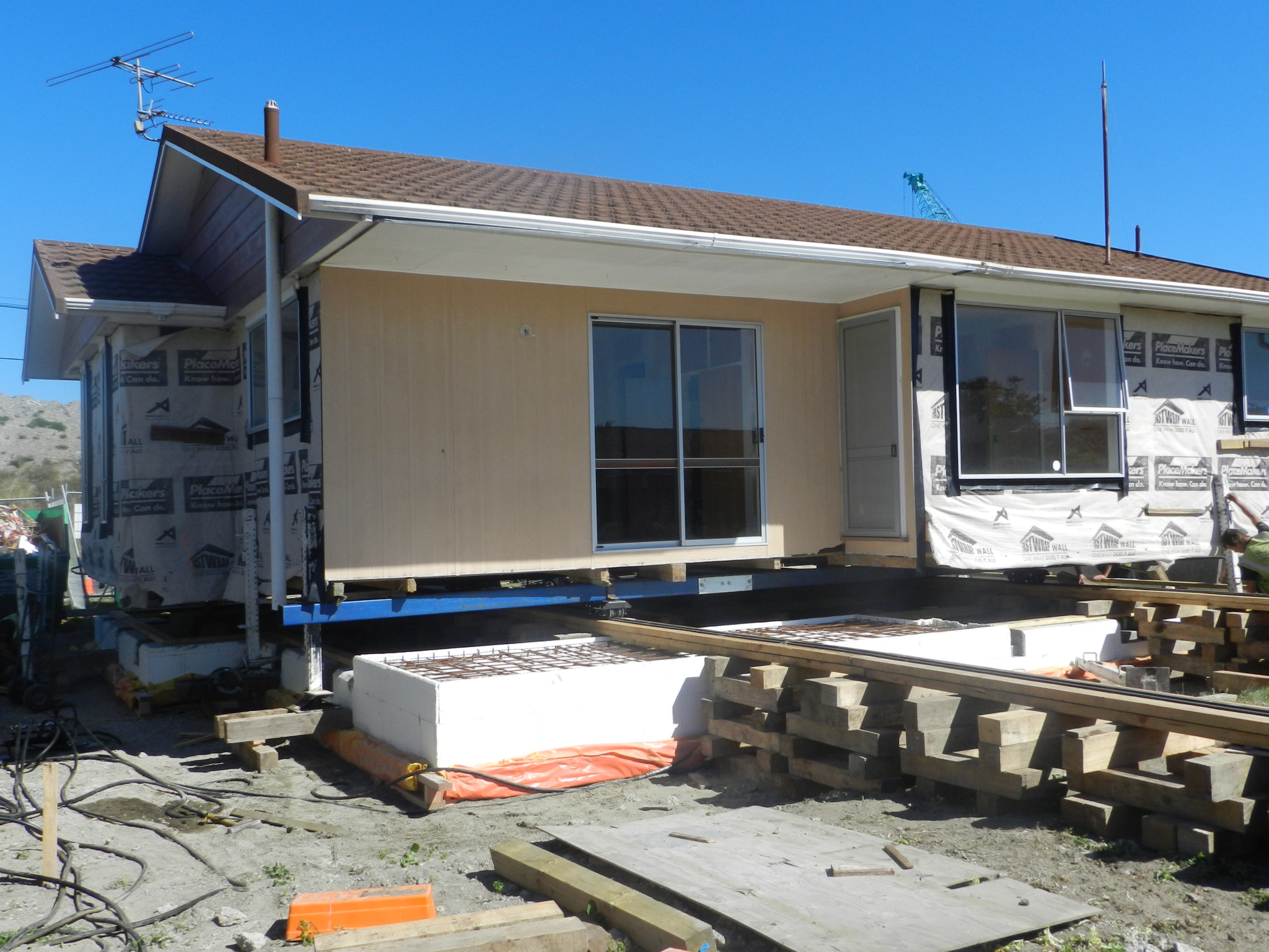 Moving a house across a property using house rolling methods in Christchurch